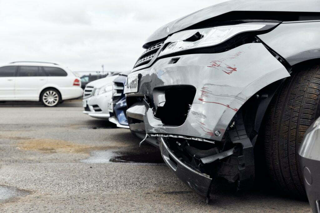 Vandalised Car With Damage To Bodywork In Car Park